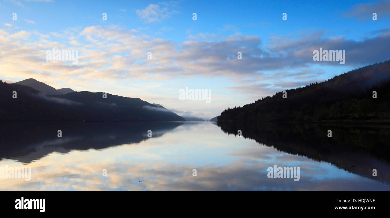 The first light of the day as dawn breaks over Loch Long, Scotland, Europe Stock Photo