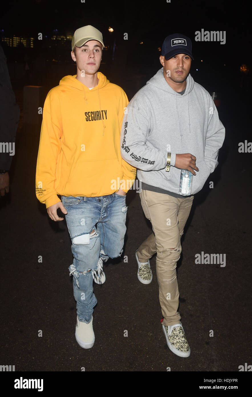 Justin Bieber seen flanked by his security team as he steps out in the  capital for dinner wearing a hoodie with the slogan Security. Justin was  seen dinning at Sushi Samba after