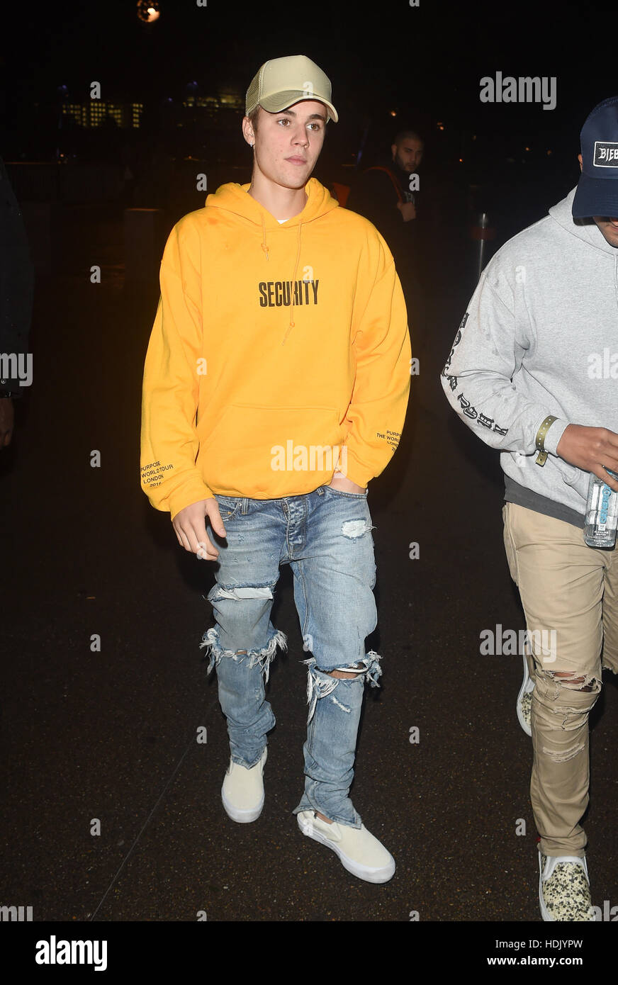 Justin Bieber seen flanked by his security team as he steps out in the  capital for dinner wearing a hoodie with the slogan Security. Justin was  seen dinning at Sushi Samba after