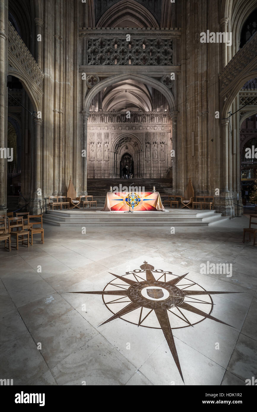 Compass symbol on the floor of the nave at Canterbury cathedral, England, founded in the sixth century, rebuilt in the romanesque style by the normans Stock Photo