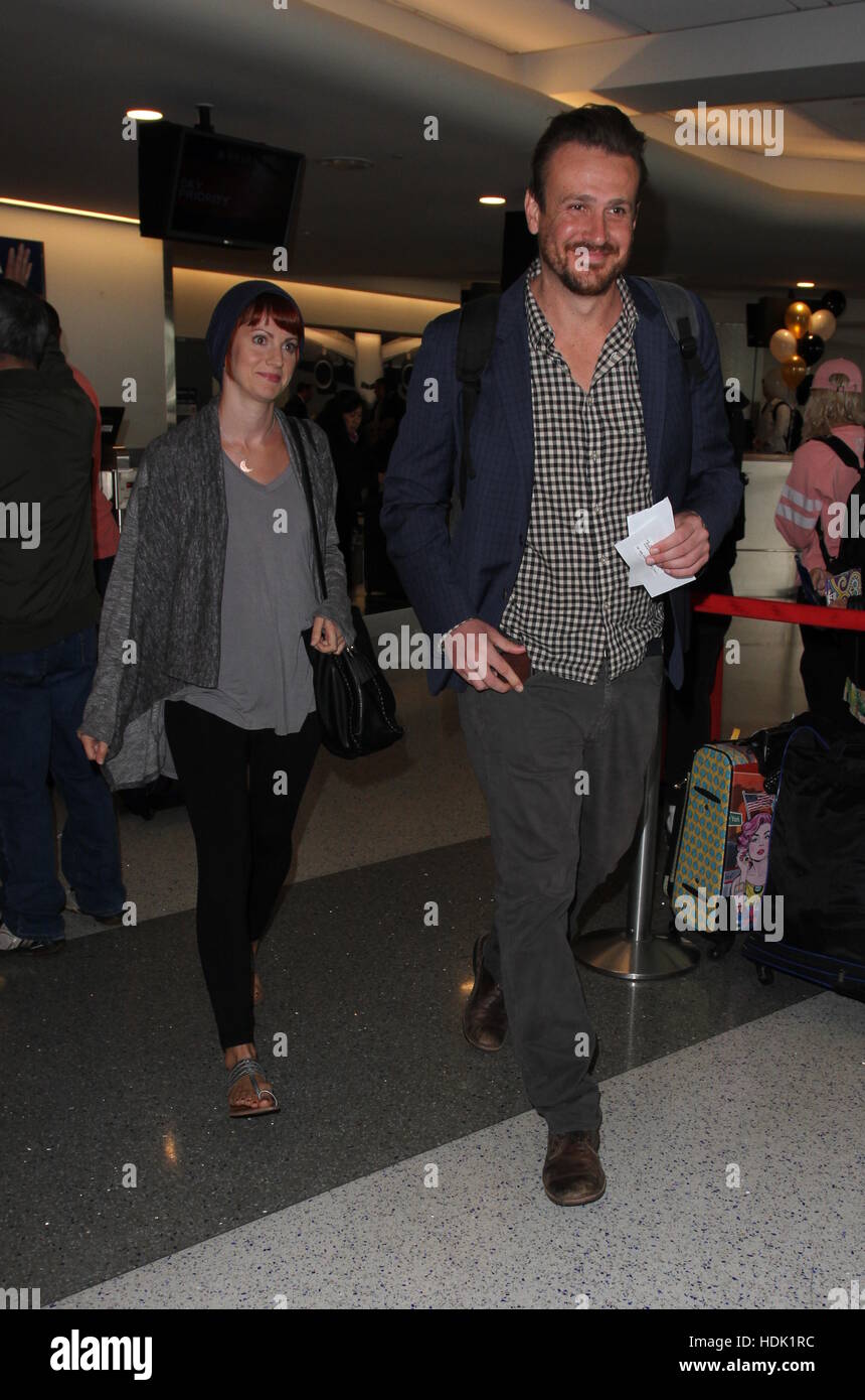 Jason Segel departs from the airport with his girlfriend photographer Alexis Mixter  Featuring: Jason Segel, Alexis Mixter Where: Los Angeles, California, United States When: 13 Oct 2016 Stock Photo