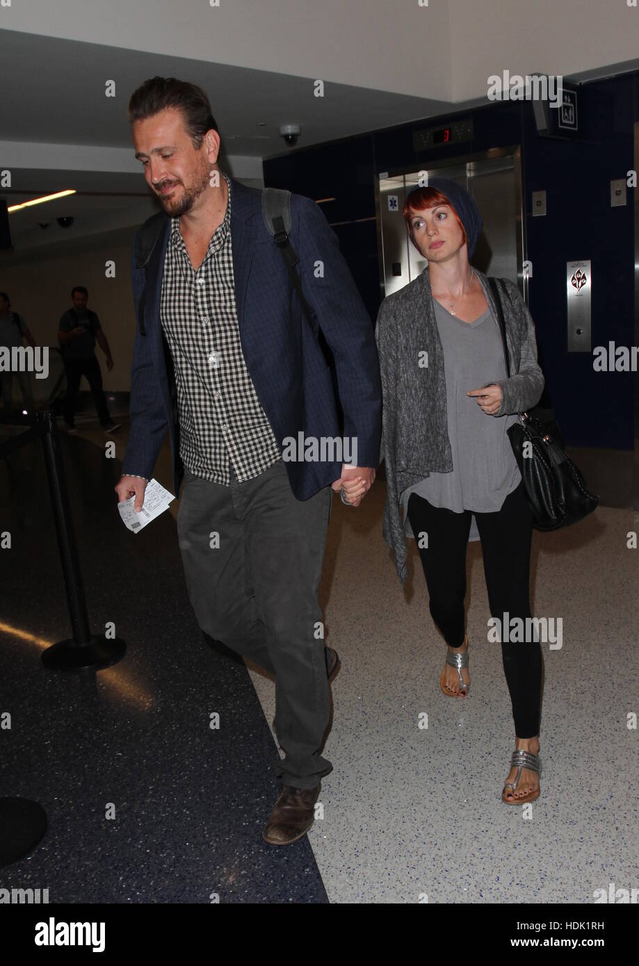 Jason Segel departs from the airport with his girlfriend photographer Alexis Mixter  Featuring: Jason Segel, Alexis Mixter Where: Los Angeles, California, United States When: 13 Oct 2016 Stock Photo