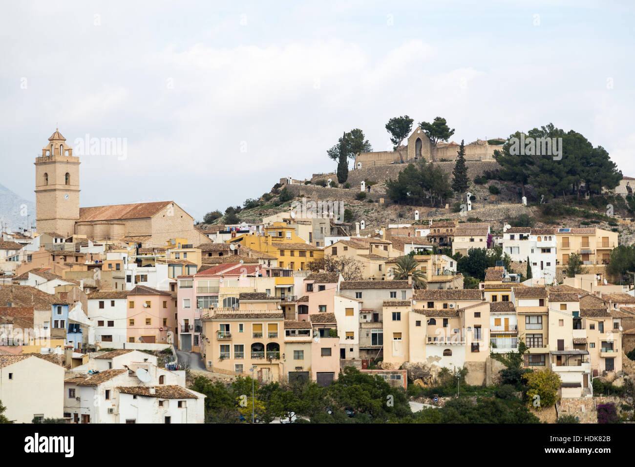 Polop, Alicante Province, Spain view from afar of hilltop fortress and town, with houses, church and castle Stock Photo