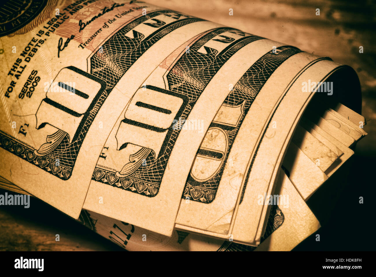 dollar bills tied with rubber band Stock Photo Alamy