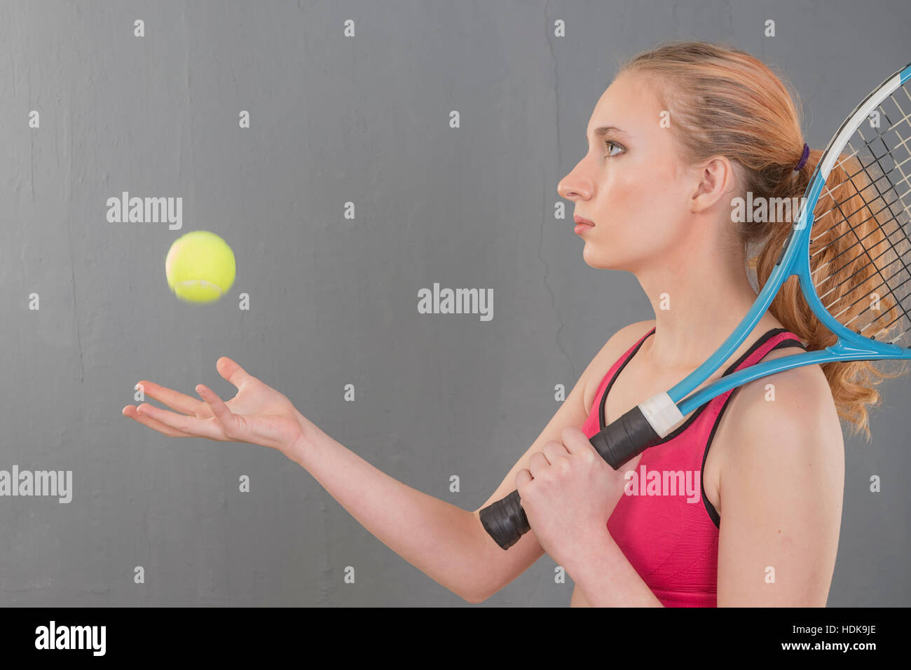 An attractive girl with a tennis racket Stock Photo - Alamy