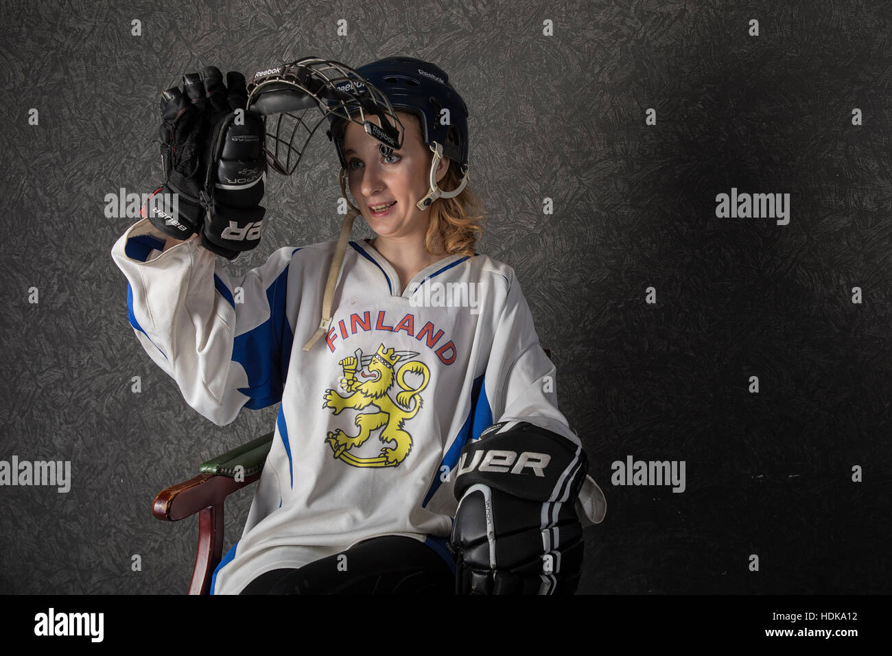 Girl in dress hockey player hockey Stock Photo Alamy