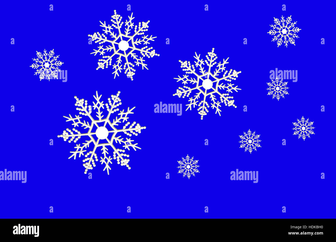 White snowflake ornaments on blue background Stock Photo