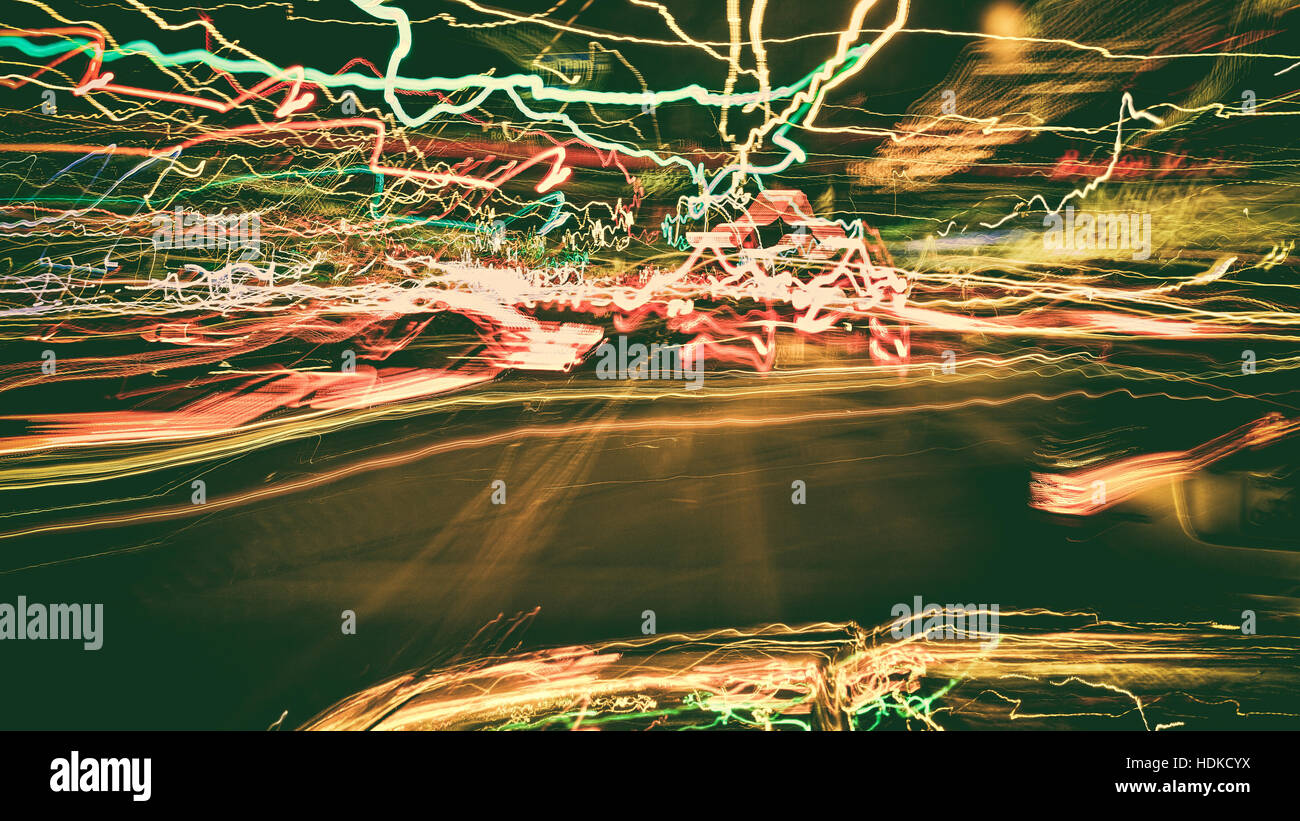 long exposure while driving, lights, signal lights, road, yellow gold, red, green, Christmas, dark Stock Photo