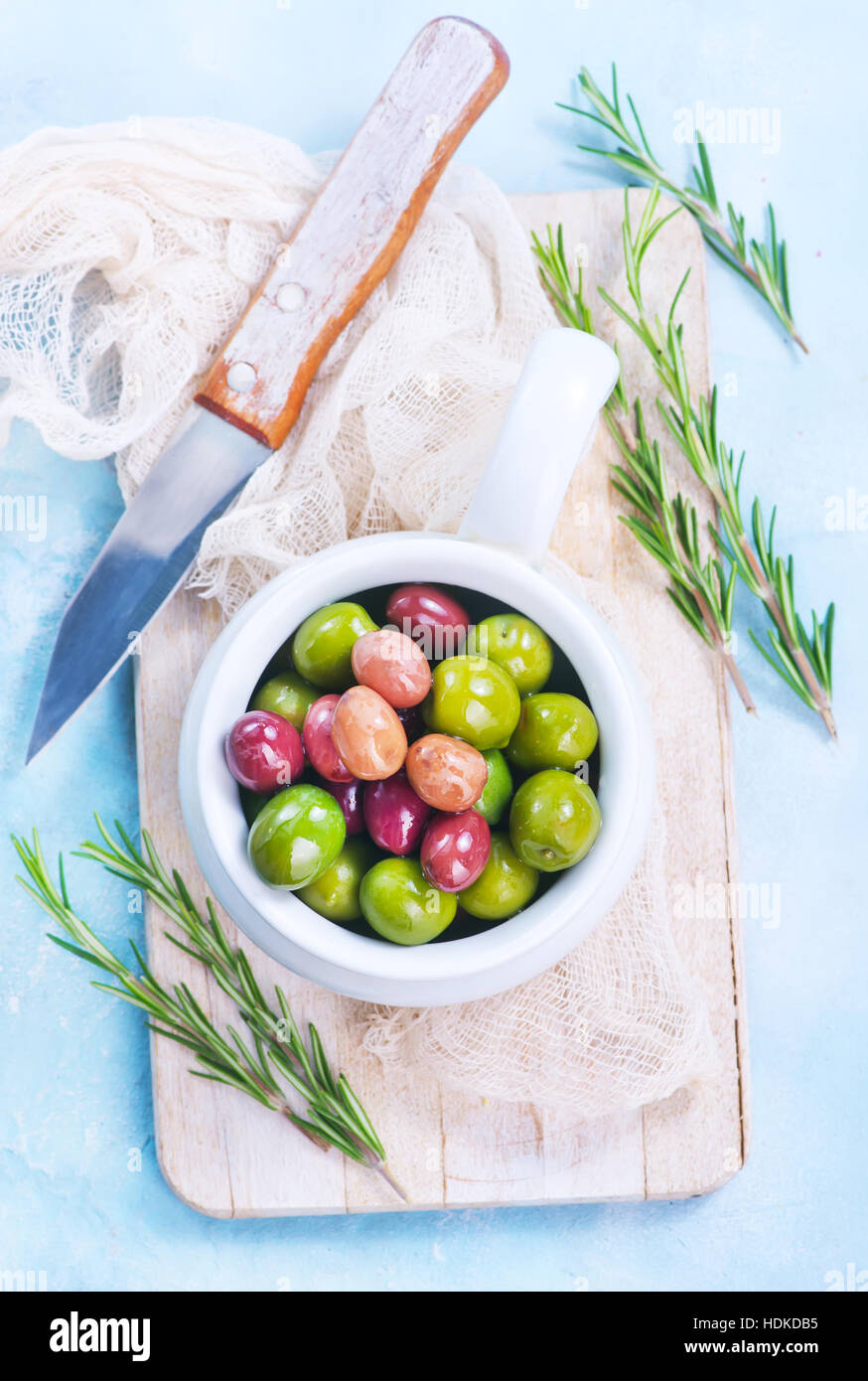 olives-in-bowl-and-on-a-table-stock-photo-alamy