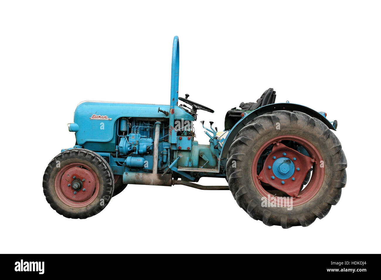 An old blue Eicher tractor isolated on white Stock Photo