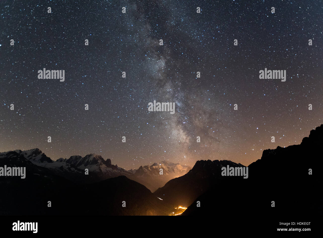 Milky Way. Night sky with stars and silhouette of a man Stock Photo - Alamy
