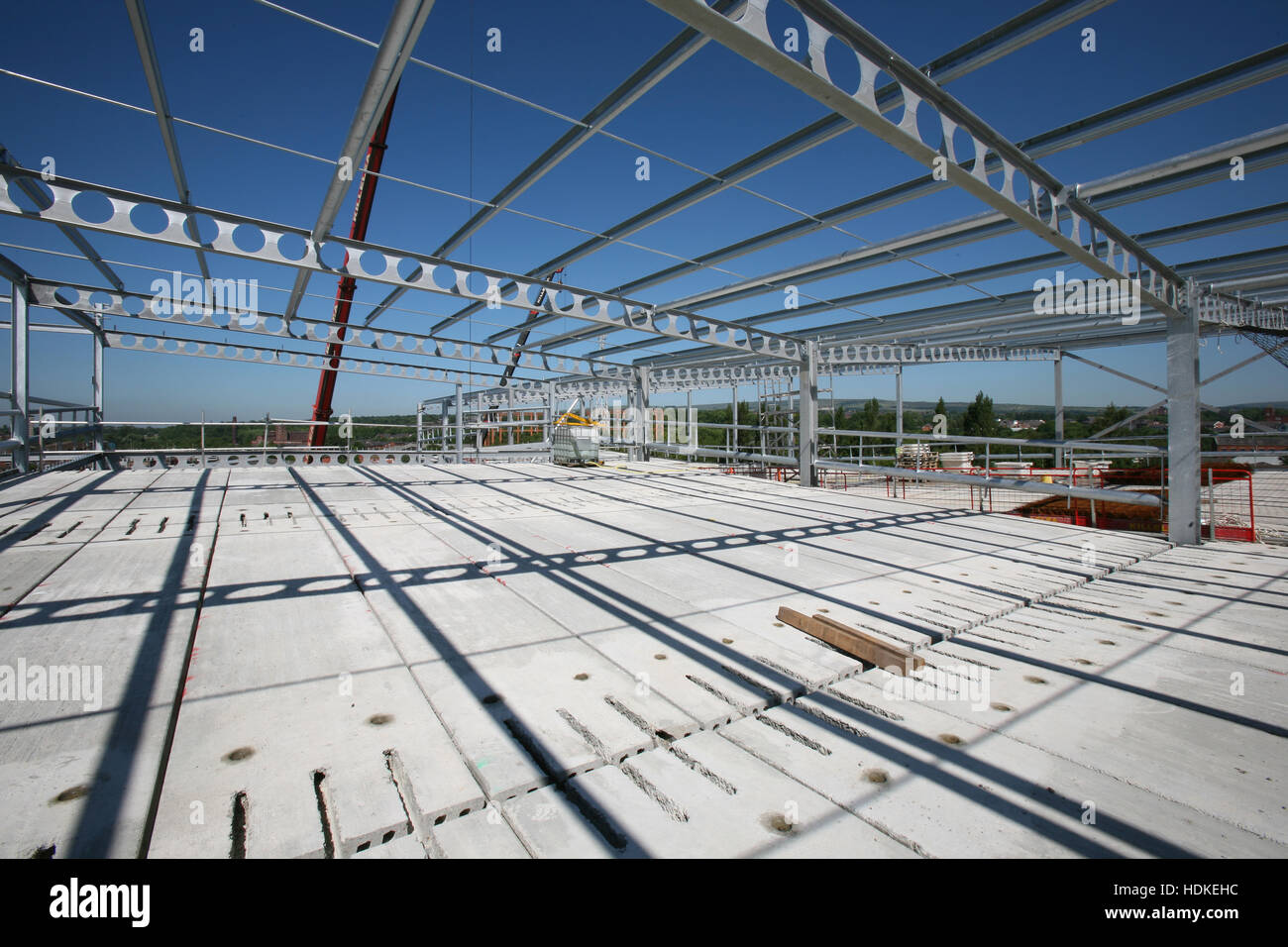 Construction site with PCC plank floor deck,structural steel frame and castellated beams on a mutistorey carpark development in Bolton, England, UK Stock Photo