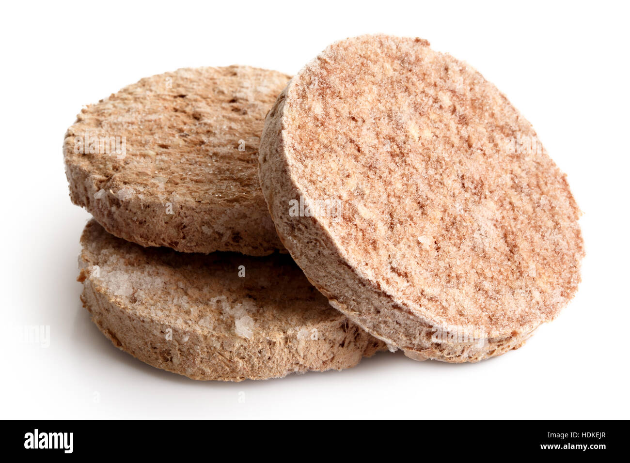 Three frozen hamburger patties isolated on white Stock Photo Alamy