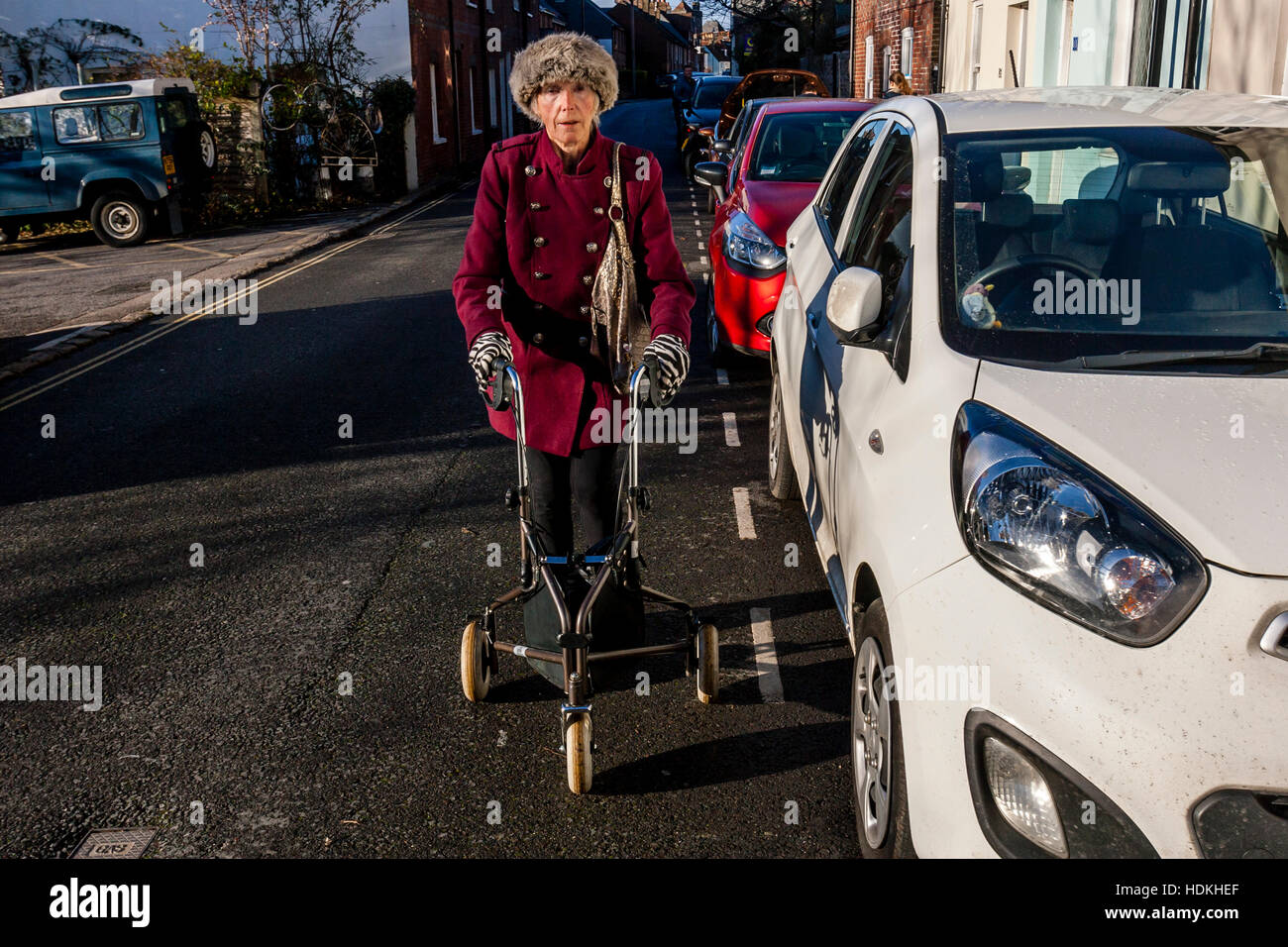 An Elderly Disabled Woman Walking With Her Rollator, Lewes, Sussex, UK Stock Photo