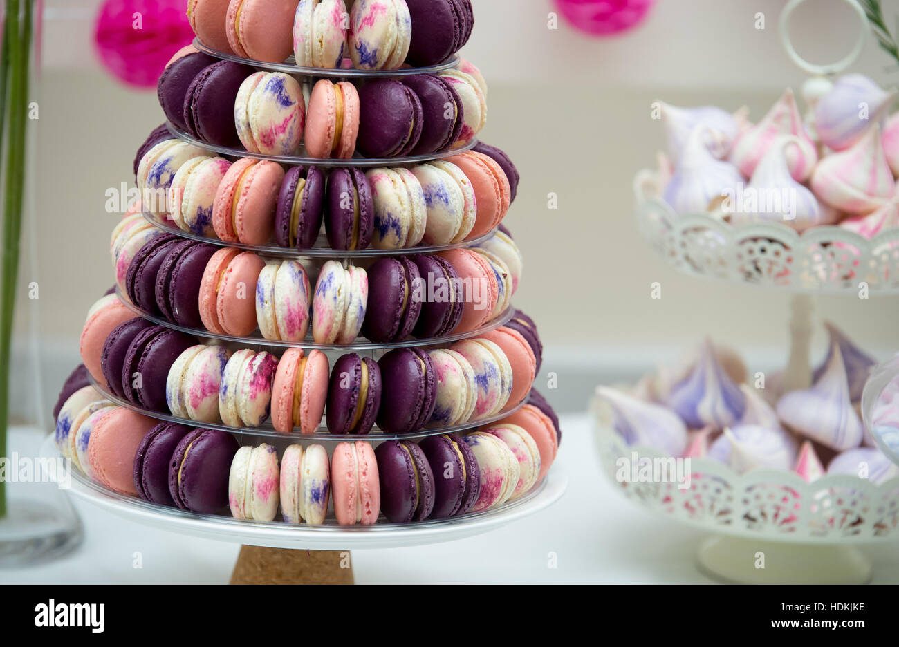 A macaroon cake. Macaroons set out in a tower formation to look like a large cake. Stock Photo