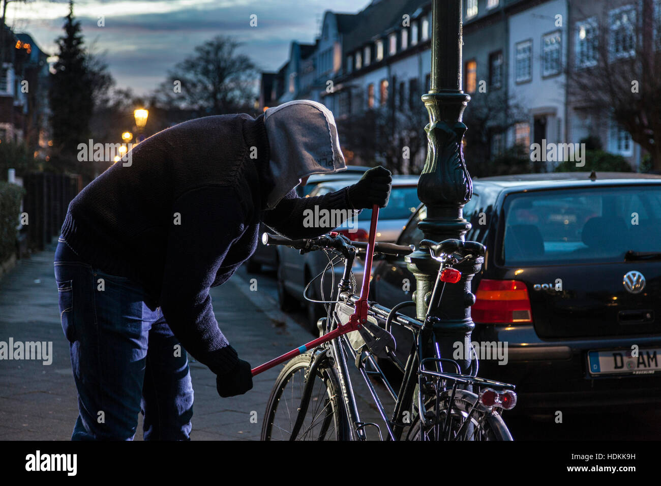 Bicycle thief at work Stock Photo