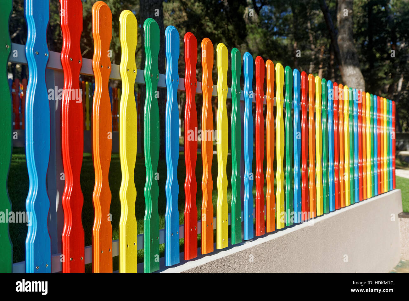 new wooden multicolored fence Stock Photo