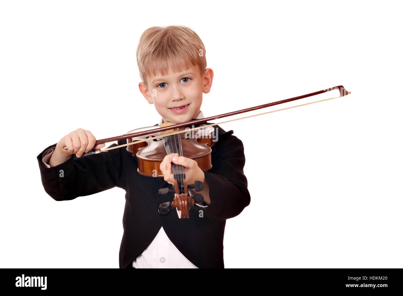 happy boy play music on violin Stock Photo