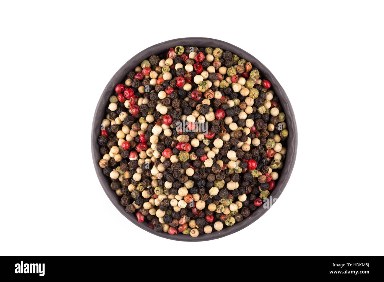 bowl of various pepper peppercorns seeds mix on white Stock Photo Alamy