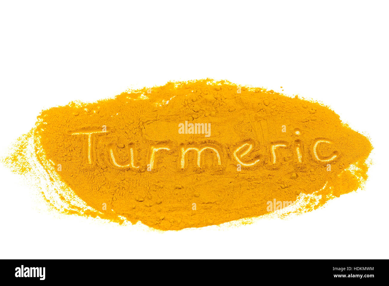Word Turmeric written in powder isolated on white background Stock