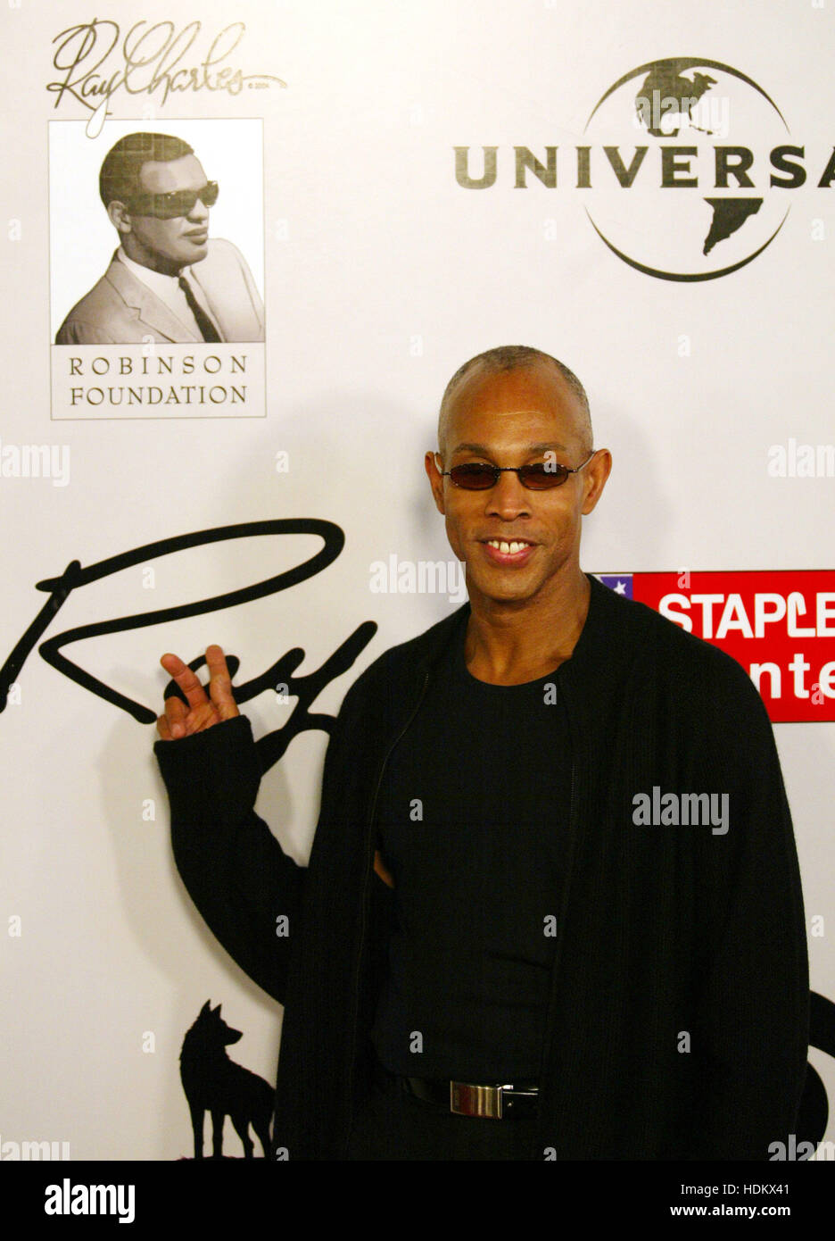Ray Charles, Jr. poses for photographers before a concert paying
