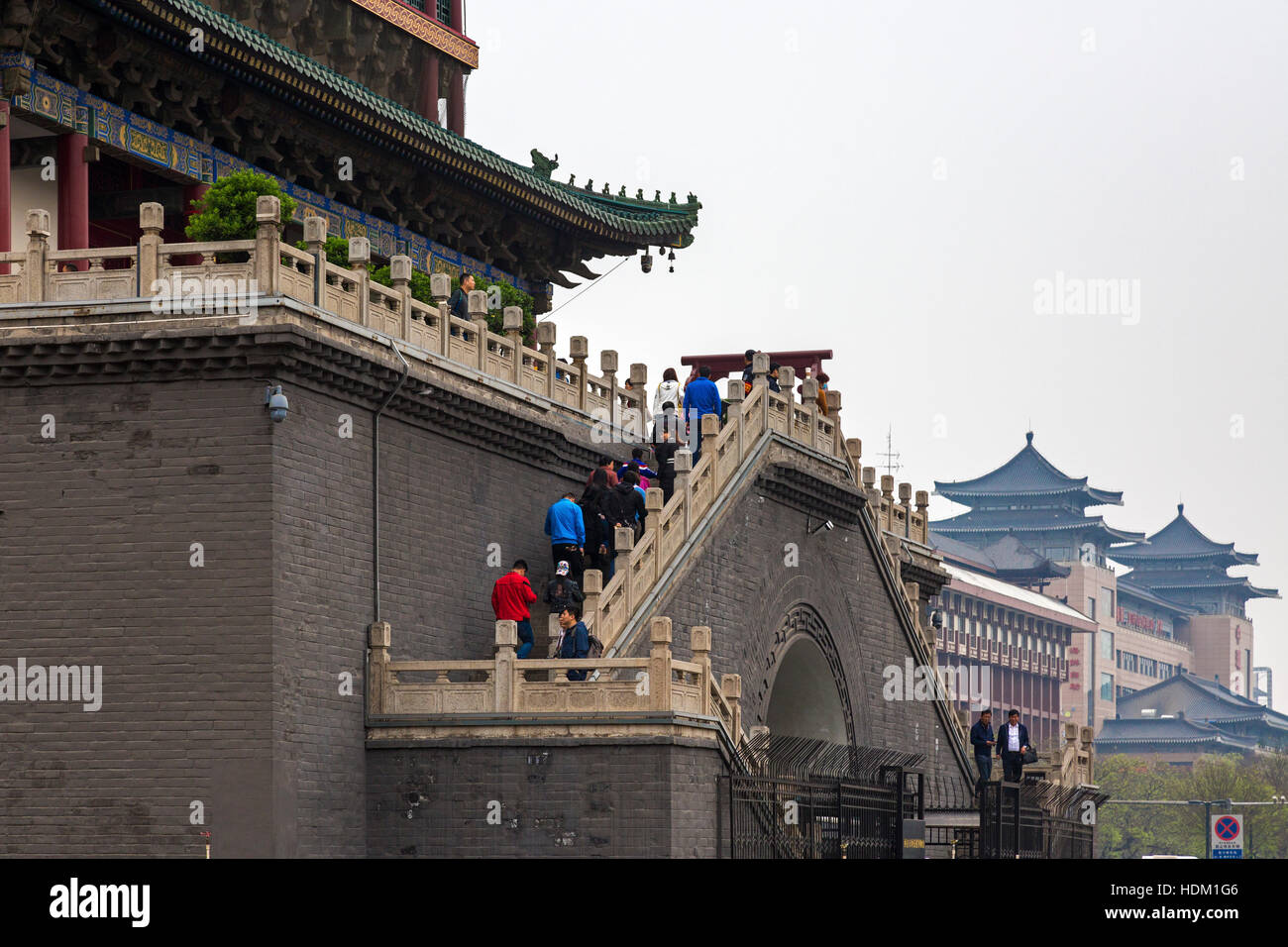 Chinese tourists climbing stairs at Bell Tower, Xian, Shaanxi, China Stock Photo