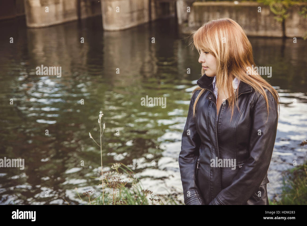Asian outside in leather jacket hi-res stock photography and images - Alamy