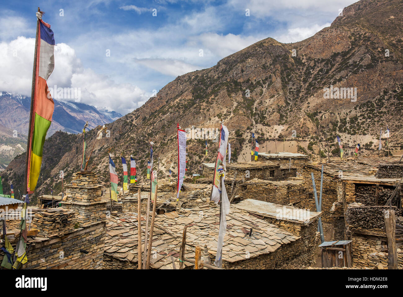 Upper Pisang village on the Annapurna Circuit Trek in the Himalayas, Nepal Stock Photo