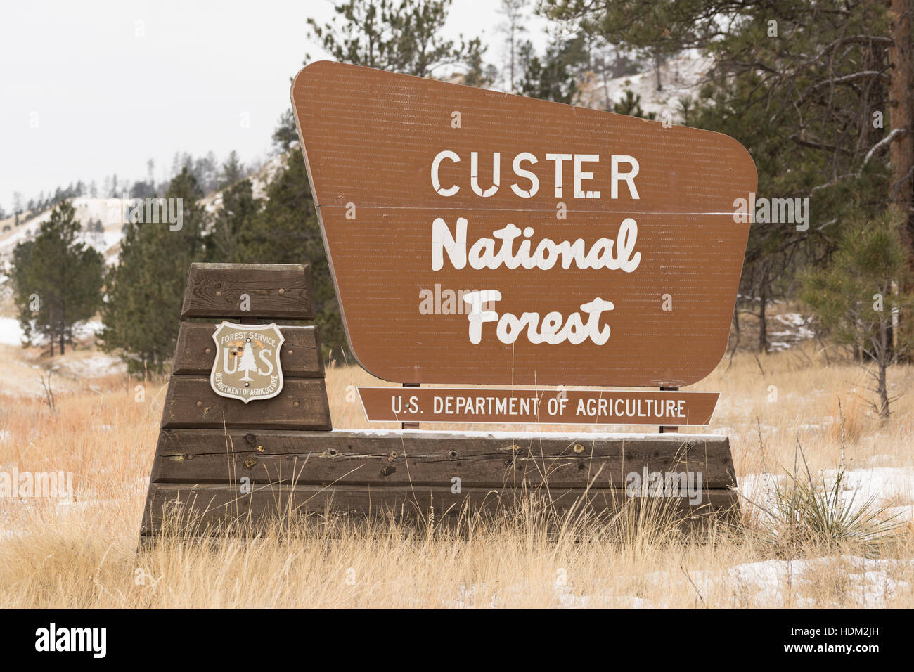 A sign that marks the entrance to a National Forest Stock Photo