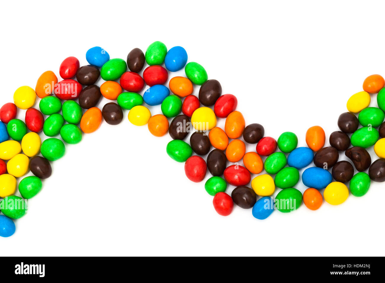 beautiful multi-colored candy on a white background Stock Photo - Alamy
