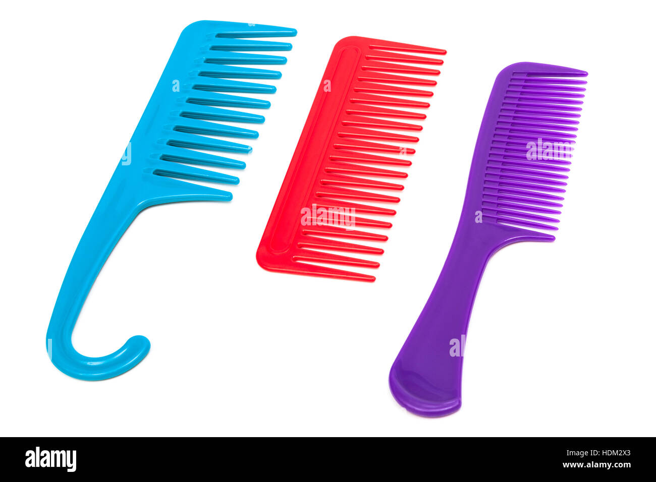 three plastic comb on a white background Stock Photo Alamy