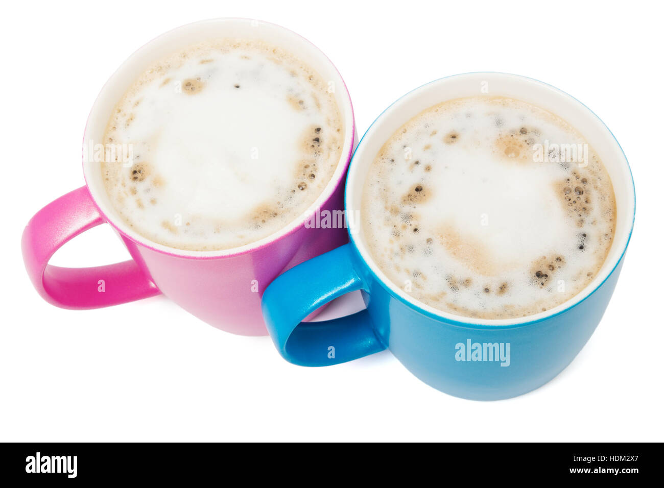 two cups of cappuccino on a white background Stock Photo