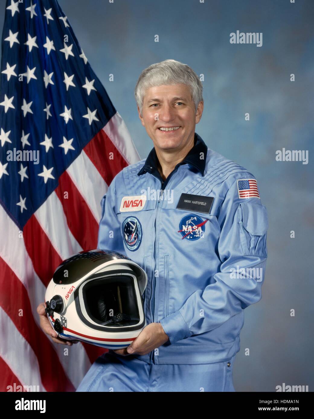 Official NASA portrait of NASA astronaut Henry Hartsfield in a blue ...