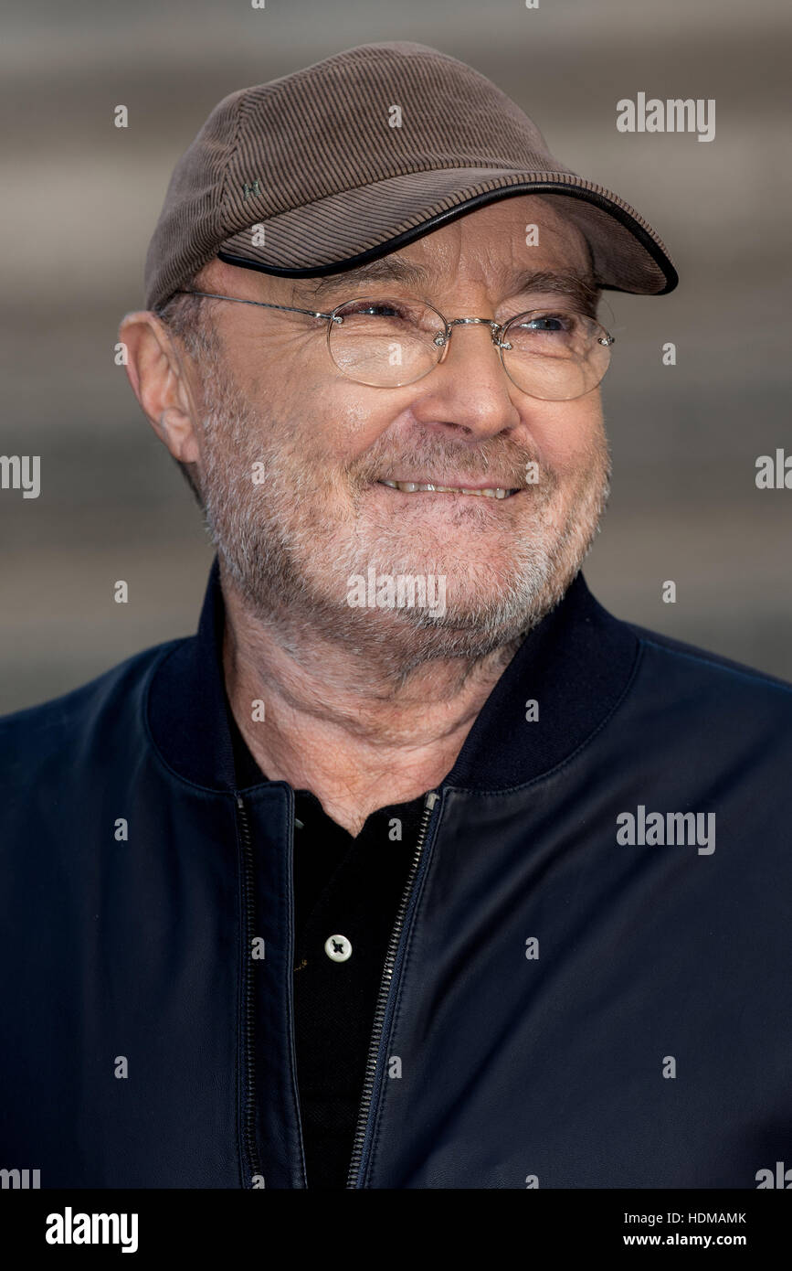 Phil Collins attends a photocall before he performs at the Royal Albert