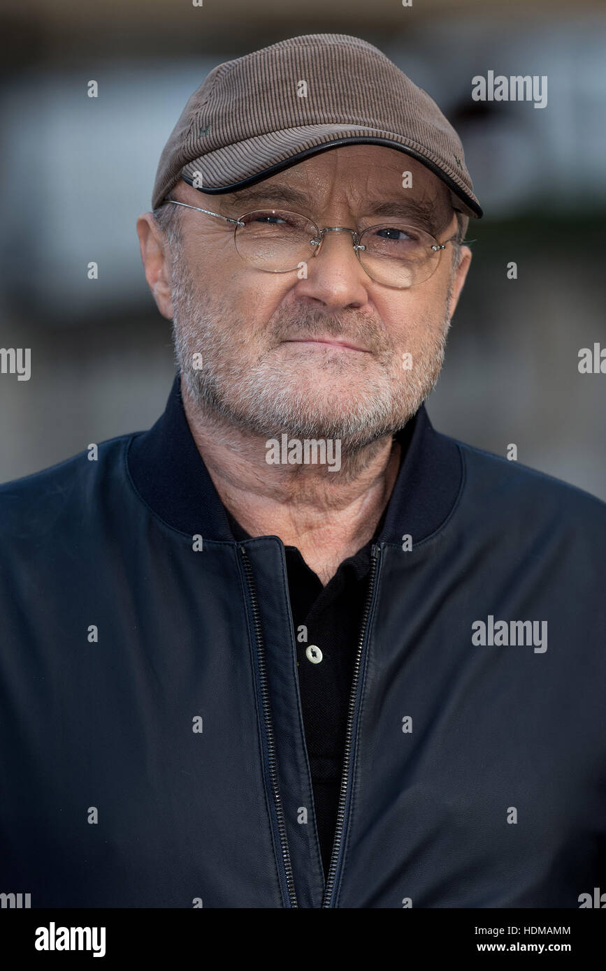 Phil Collins attends a photocall before he performs at the Royal Albert
