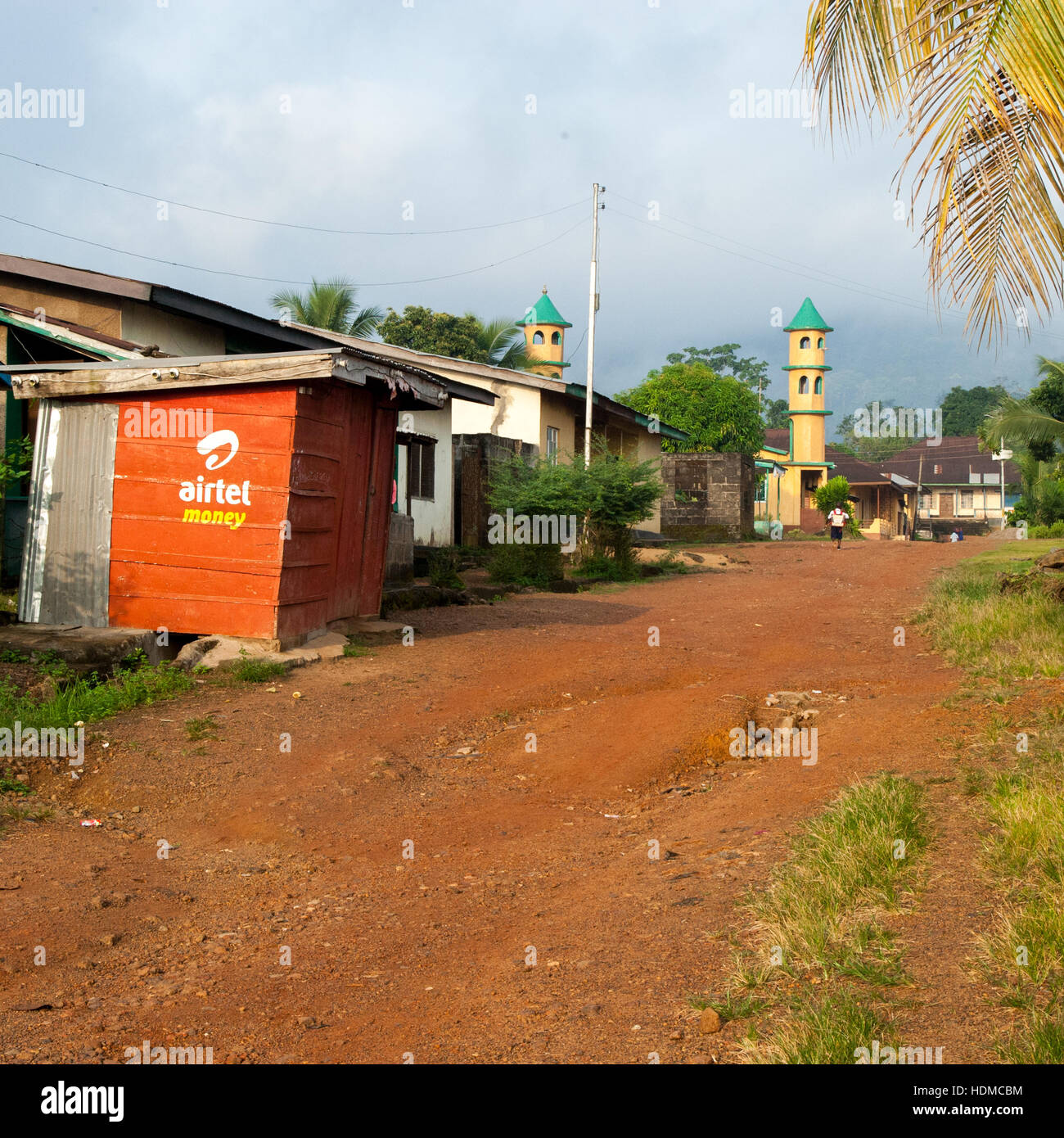 Mosque and cellphone kiosk in Kenema, Sierra Leone Stock Photo