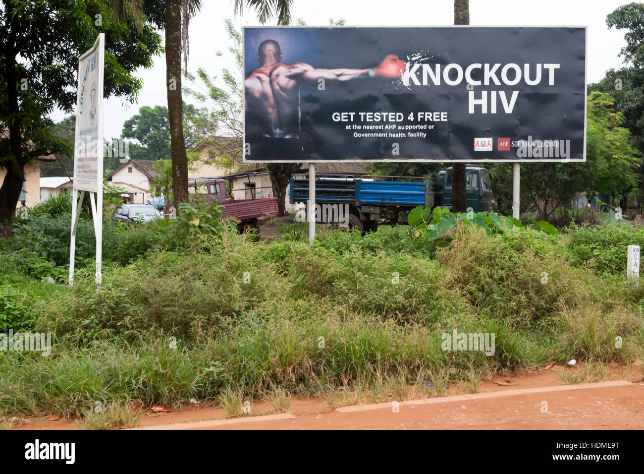 'Knockout HIV' spells a billboard in Kenema, Sierra Leone. Educational campaign to fight Aids (HIV) Stock Photo