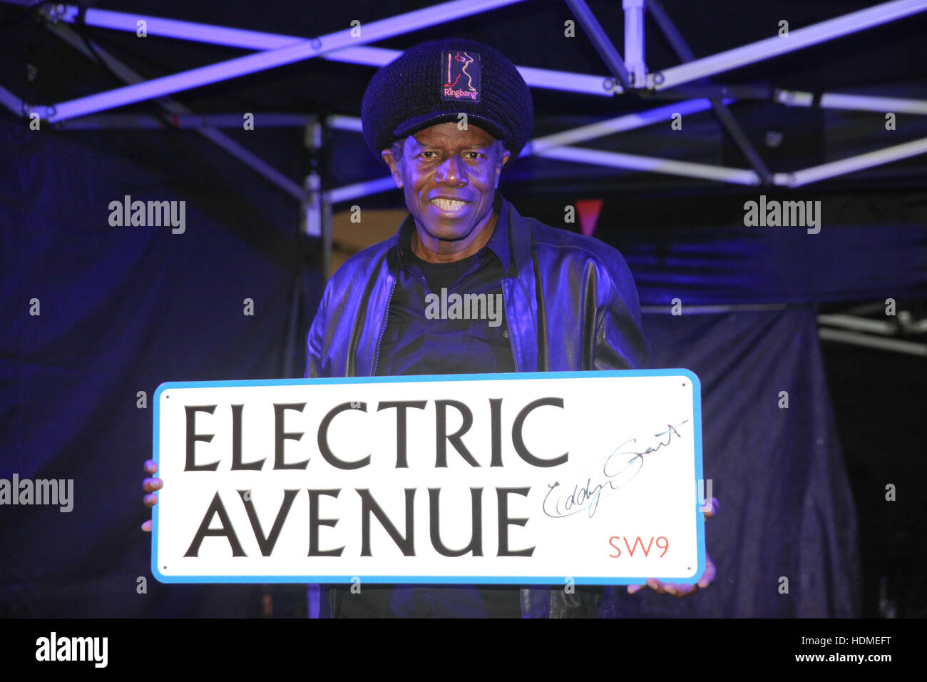 Eddy Grant turns on a new Electric Avenue illuminated sign to mark the
