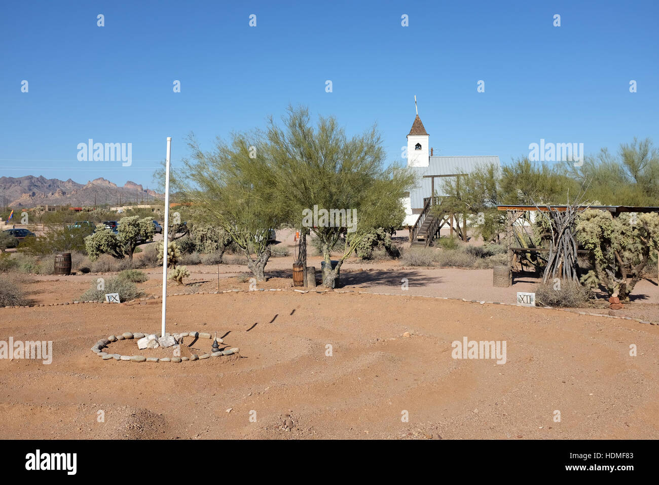 Labyrinth at the Superstition Mountain Museum with the Elvis Memorial Chapel in the background, in Apache Junction, Arizona. Stock Photo