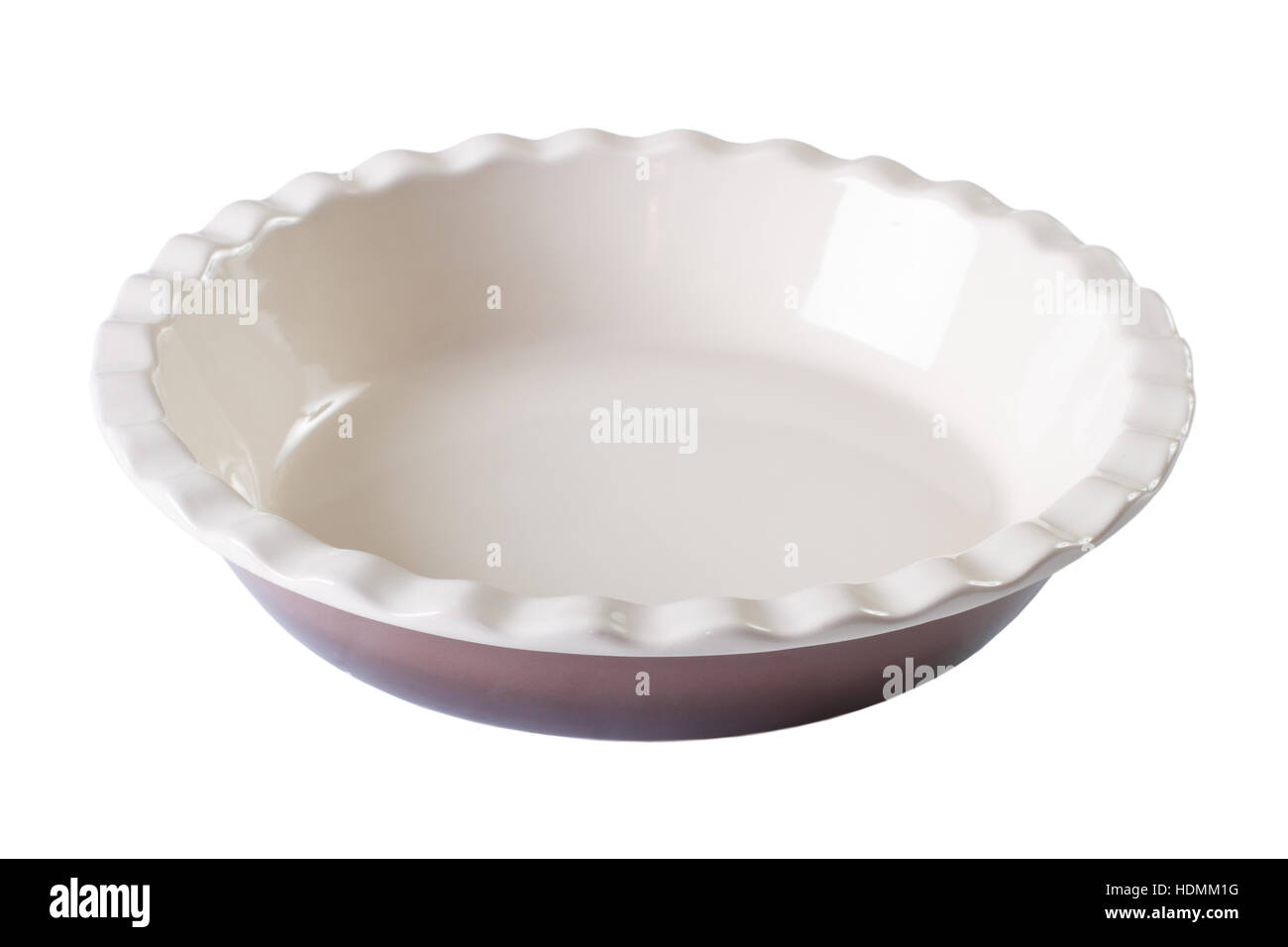 Round baking dish empty isolated on white background. Horizontal close-up Stock Photo