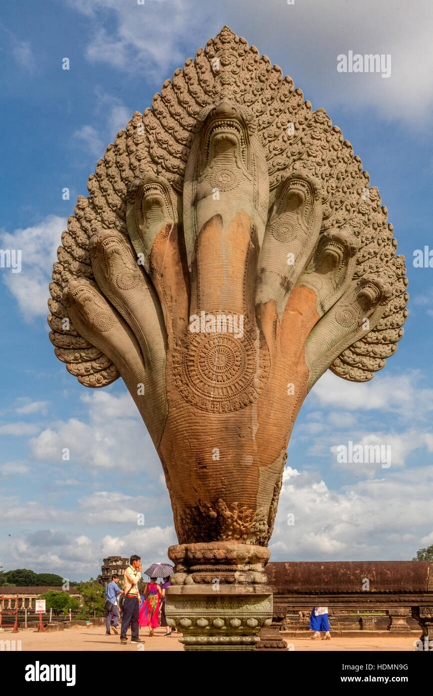 One of several restored heads of Naga, a deity taking the form of a King Cobra snake in Hinduism, Buddhism and Jainism. This one is at the head of the Stock Photo
