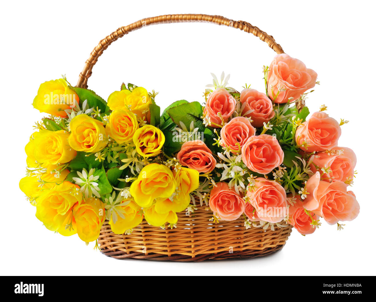 silk flowers in a basket isolated on white background Stock Photo Alamy