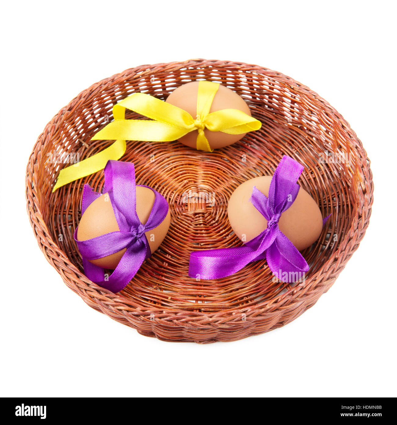 Easter Eggs In A Wicker Basket Isolation On A White Background Stock Photo Alamy