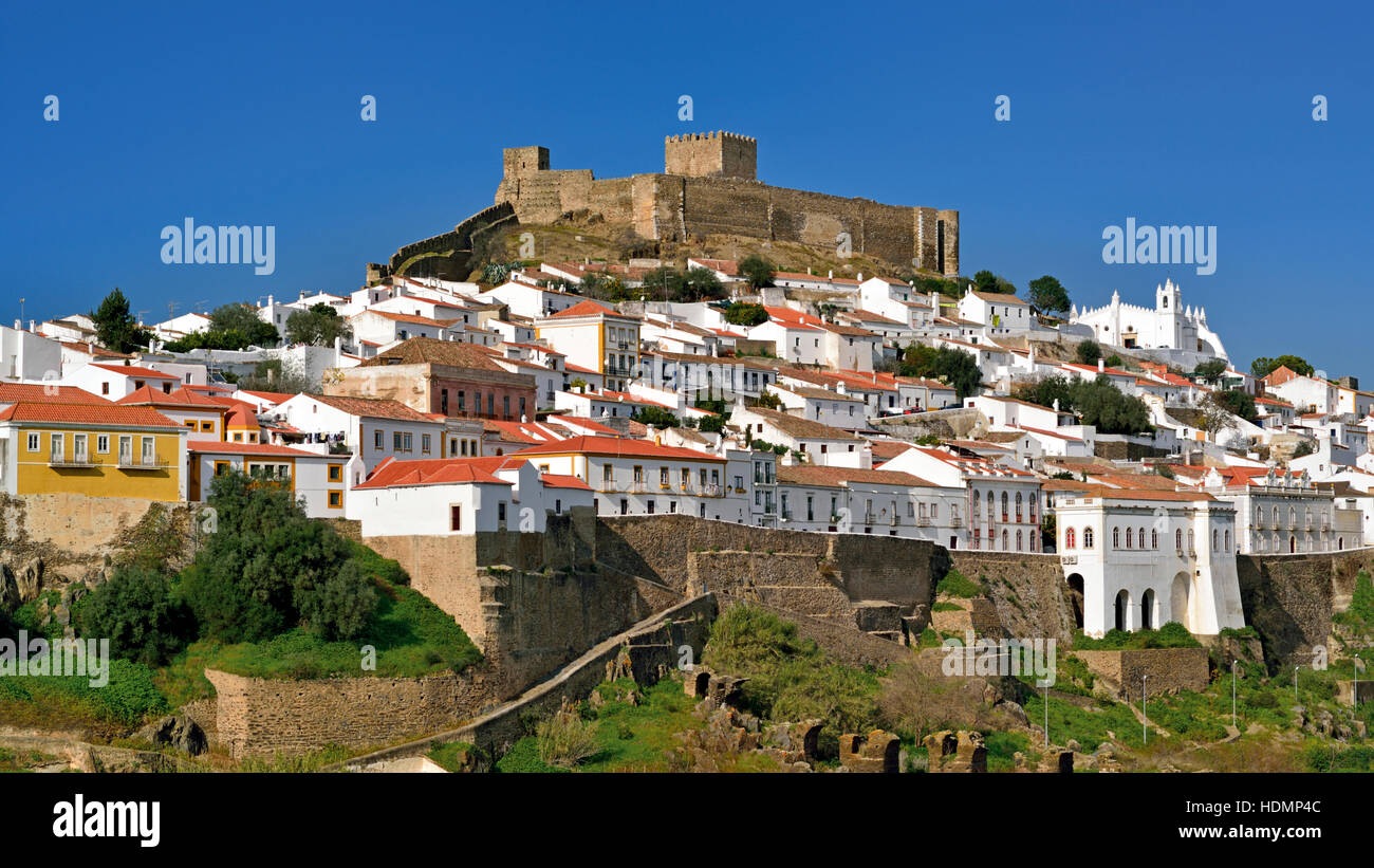 Portugal, Mértola: View to charming little town with white washed houses around a medieval castle at the top Stock Photo