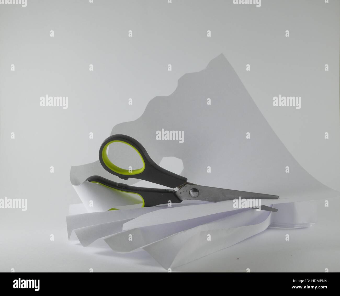 Cutting paper scissors hires stock photography and images Alamy