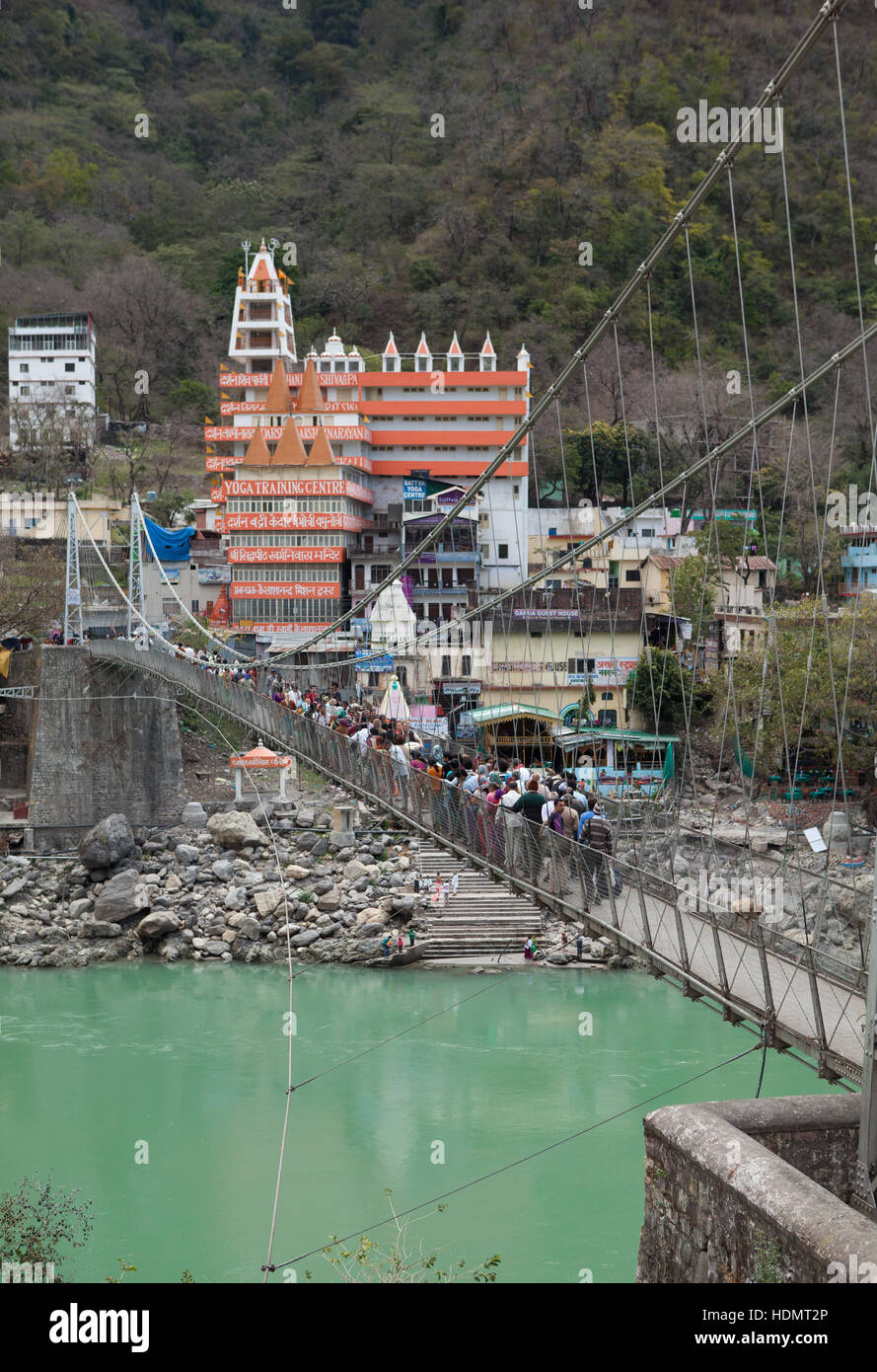 Laxman Jhula bridge over Ganges river in Rishikesh, Uttarakhand, India Stock Photo