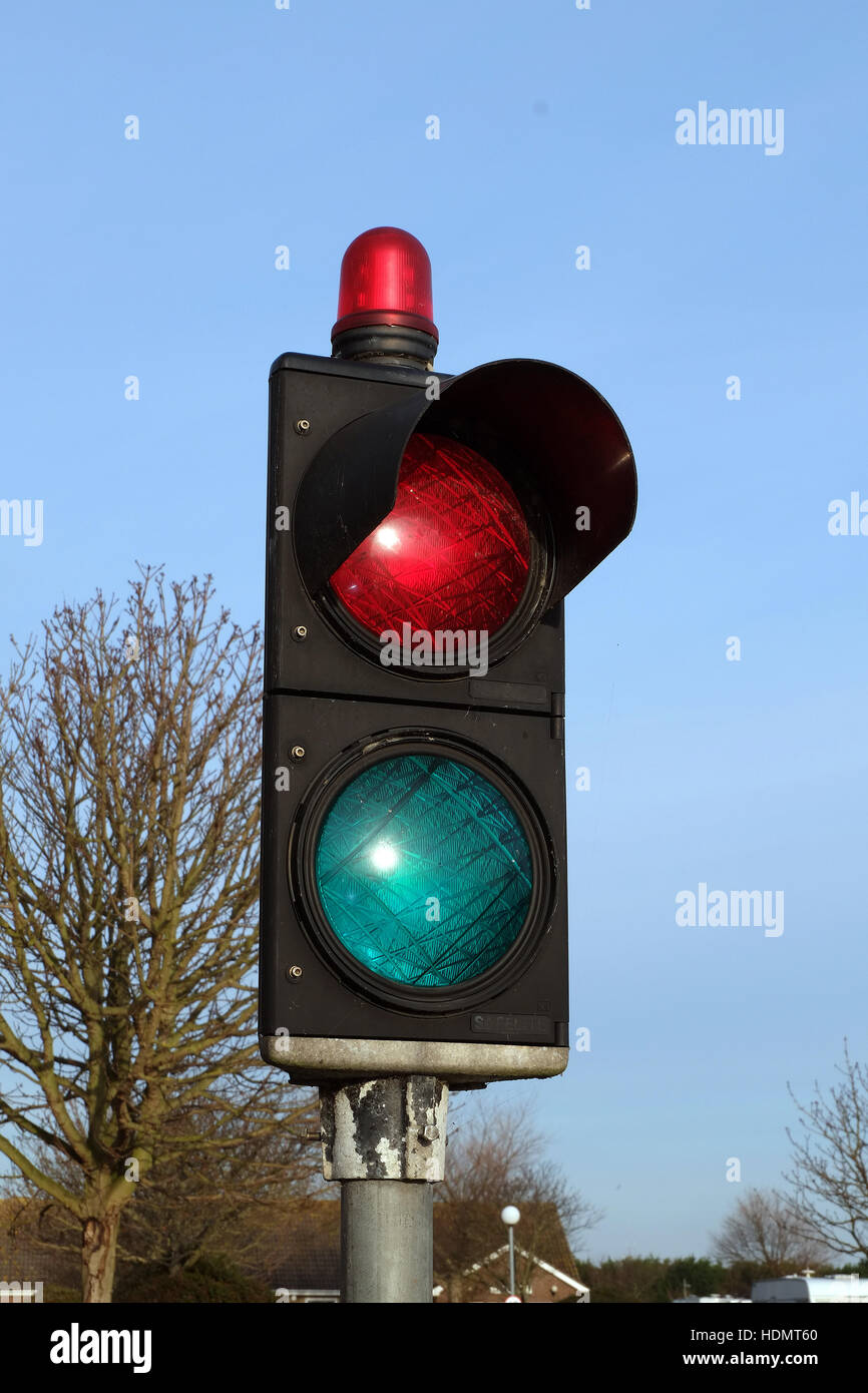 Red green stop go lights on residential and holiday caravan park. Stock Photo