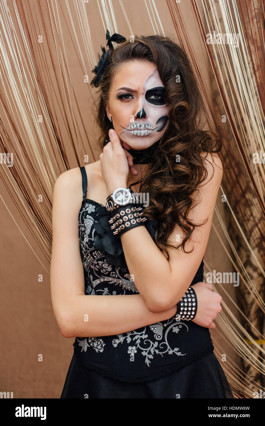 Young Woman In Black With Half Face Skull Make Up Stock Photo Alamy