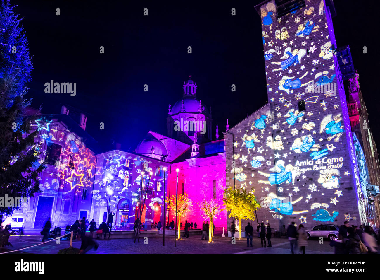 Festive Christmas decorations lights on facades of buildings on Piazza Duomo (Cathedral Square) in Como, Italy Stock Photo
