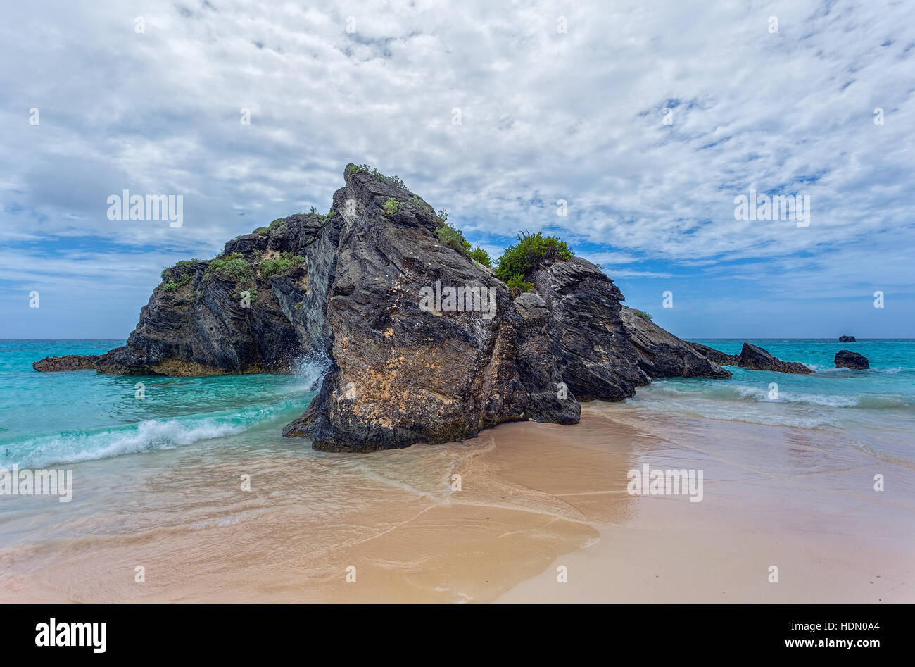 A large rock in the atlantic ocean in the coastal waters of Bermuda. Stock Photo